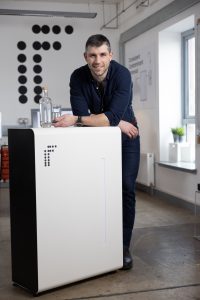 Founder of IF Duncan Peters with the WaterOne purification unit