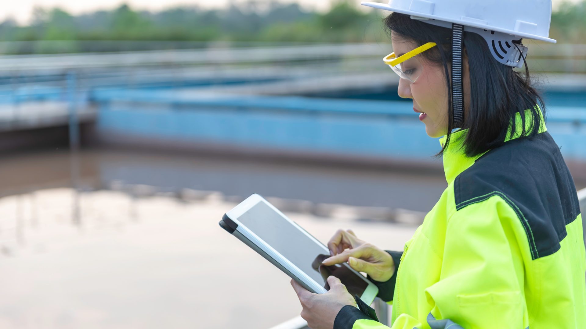 Environmental engineers work at wastewater treatment plants,Water supply engineering working at Water recycling plant for reuse