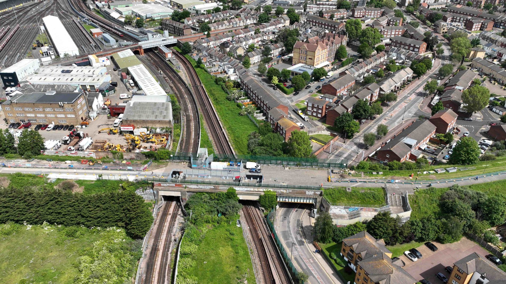 The Northern Outfall Sewer passes above the Jubilee Line, Docklands Light Railway and Manor Road.