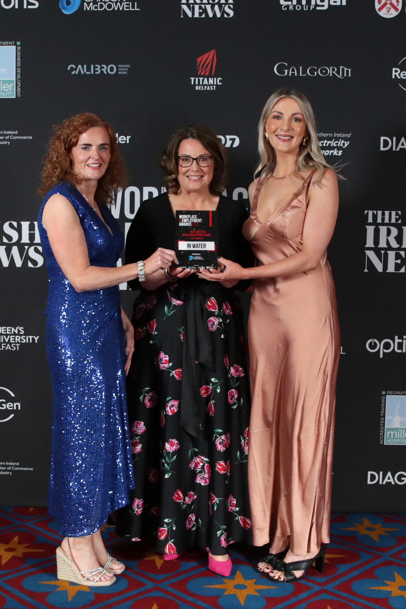 NI Water’s Clodagh Patterson and Geraldine Hume collect the Irish News Workplace and Employment Award for Best Employee Development Programme (Large Business) from Orlagh O'Neill of Carson McDowell.