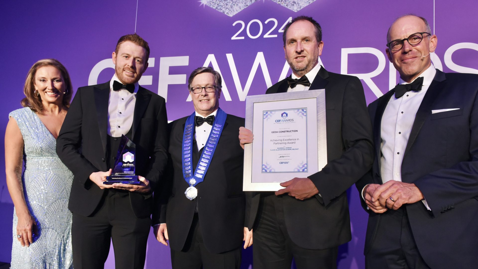 (L-R) Claire McCollum, Niall McKenna Geda Construction, Bryan Vaughan (CEF President), NI Water’s David McClean and top broadcaster and TV Host Phil Spencer pictured at the recent CEF awards.