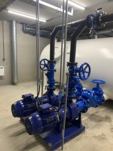 Pumps installed as part of a VacuflowR vacuum sewerage system 