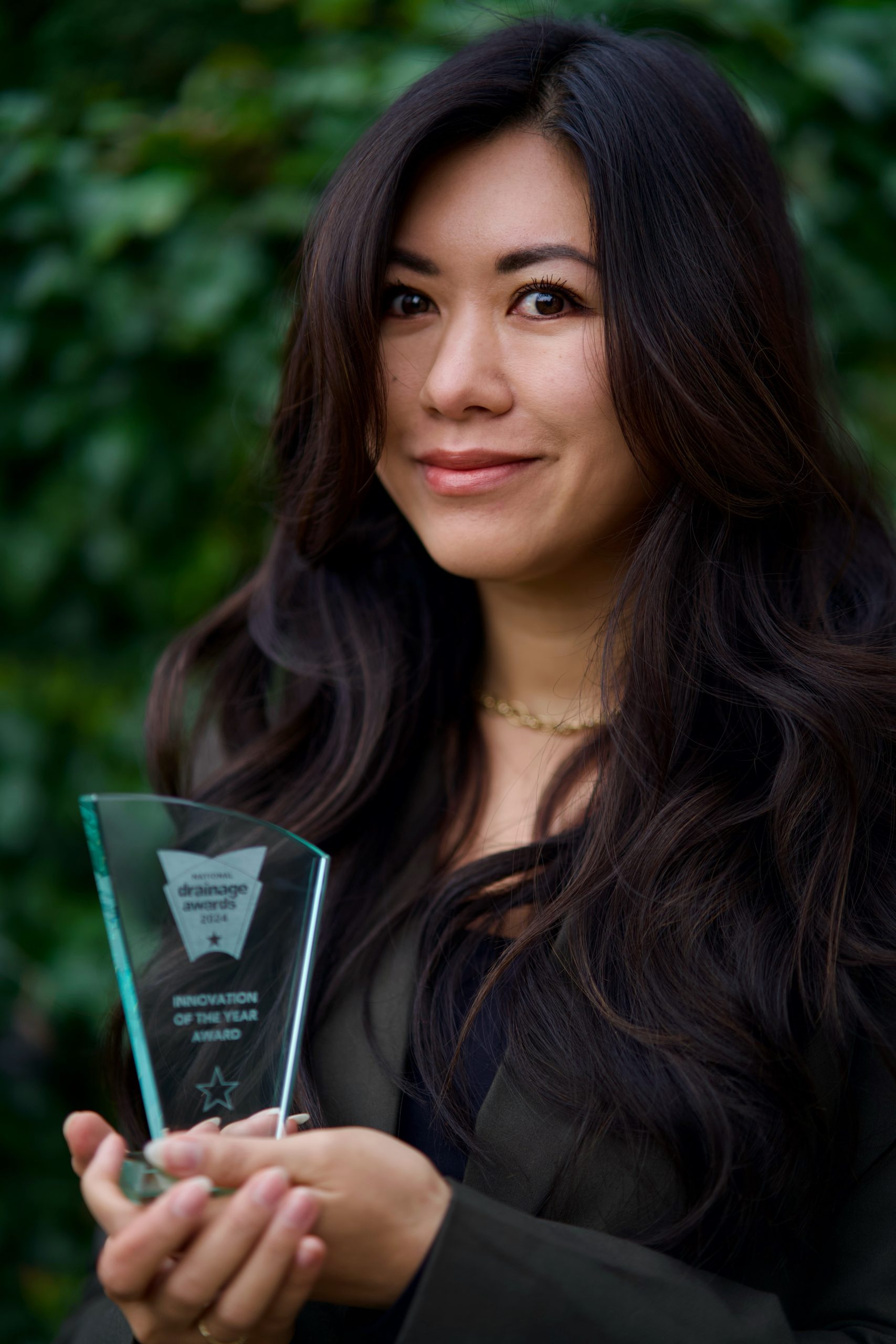 Eco Clarity’s head of business development, Laura Su, accepts the NADC award on behalf of Eco Clarity 