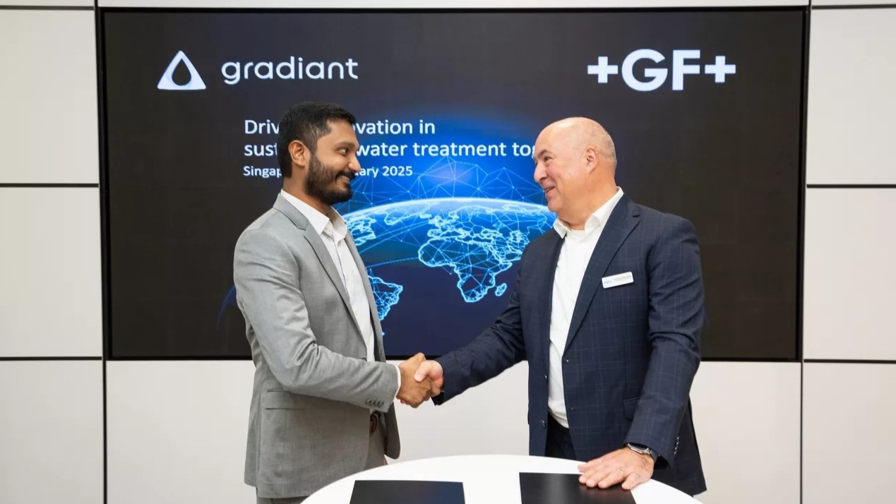 Handshake between Kaarthic Madhavan, EVP Corporate Development & Growth of Gradiant, and Wolfgang Dornfeld, Head of BU Asia and Global Head of Microelectronics, GF Piping Systems. Source: GF Piping Systems