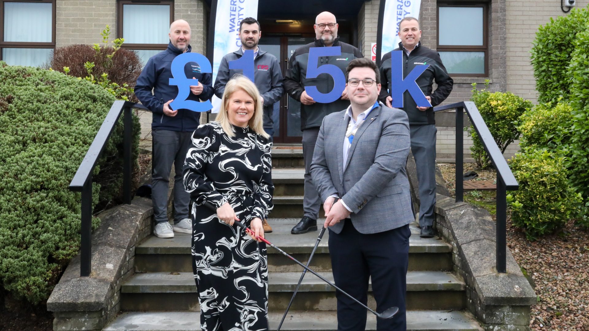 £15,000 in the bag for WaterAid: Colin McKeever and Gareth Smyth from GRAHAM (back right), joined Mark McEvoy, RPS and Michael Donnelly, NI Water – part of the event organising committee – and Paul Rocks, Chair of CIWEM NI Branch present Dr Sara Venning WaterAid NI President & CEO of NI Water with the £15,000 raised through the 2024 charity golf event.
